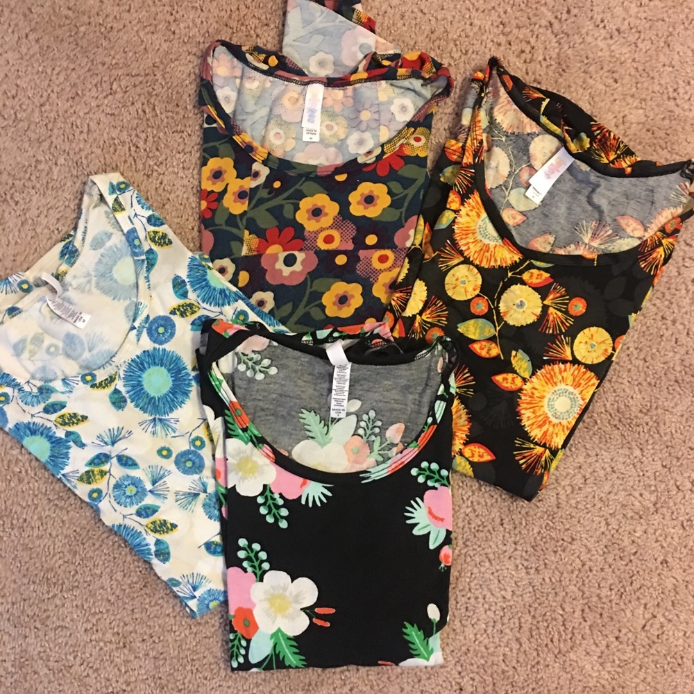Lot of four Lularoe tops !!
